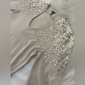 Women’s beige top with sequence